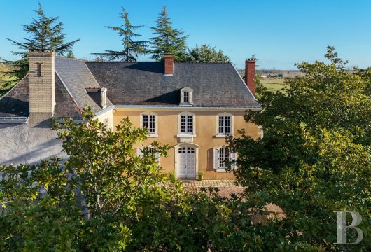 pays-de-loire - A 15th and 18th-century former priory, with outbuildings and a landing strip, in the former Anjou province, on the outskirts of a village