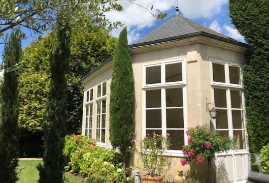 A 300-m² manor house with an orangery, outbuildings and a landscaped garden, in the south of the Orne area, in the former Perche province, in Bellême
