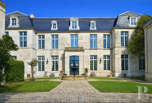 poitou-charentes - An 18th-century townhouse with outbuildings and an enclosed garden, nestled in the city of Angoulême in France’s Charente department