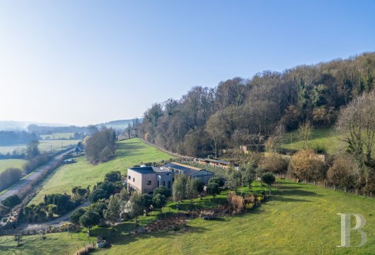 lower-normandy - A contemporary dwelling and its breeding farm, nestled between woods and a river, a short distance from Pont-l’Eveque, in the Pays d’Auge region