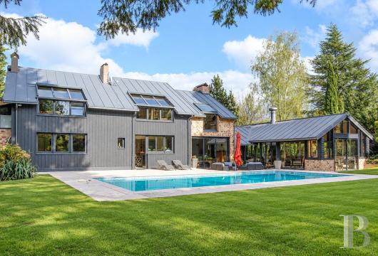 paris - A south-west-facing house with a pool and a 270m² floor area, on a private road by Saint-Nom-la-Bretèche golf course in France’s Yvelines department