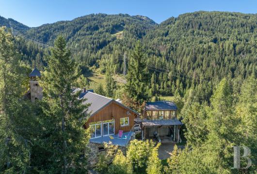 rhones-alpes - Dans les Alpes, à proximité immédiate d'un domaine skiable,  un grand chalet aménagé en loft, dans une ancienne gare de téléphérique