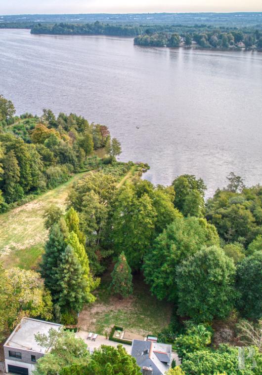 residences & character houses for sale - pays-de-loire - À 20 min de Nantes, sur les rives de l’Erdre avec un port privé, une ancienne maison de pêcheur et son extension contemporaine